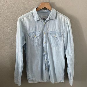 Small light denim colored button down